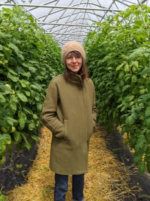 Molly Riordan in greenhouse